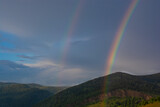 Fototapeta Tęcza - rainbow over the mountains
