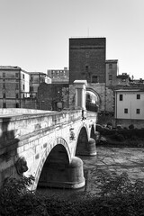 Poster - Stone bridge on Bacchiglione river and historic tower with gate in Padua city