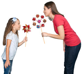 Wall Mural - Portrait of young woman and girl play with toys isolated on white background