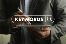businessmanman search website for content keywords on laptop browse in office optimize seo engine