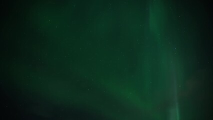 Wall Mural - The Northern Lights (Aurora Borealis) dancing high on the night sky. Timelapse. 
