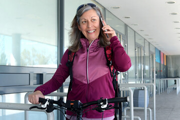 Middle-aged woman rides a bicycle