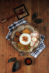 A plate of Indonesian traditional food a plate of Uduk Rice