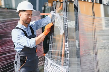 Wall Mural - Glass,Aluminium and PVC industry workers