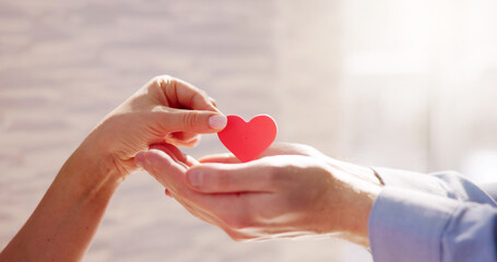 Close-up Of Woman Giving Red Heart