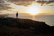 © Trebor Eckscher - Sunset panorama, a man enjoys the beautiful view of the sea at La Pared, Fuerteventura in the Canary Islands
