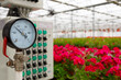 © Andrii  - Irrigation system equipment in a flower greenhouse