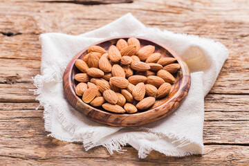 Wall Mural - pile of natural almonds (Prunus dulcis) close-up image