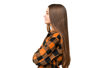 Poster - Teenager girl over isolated chroma key background in lateral position