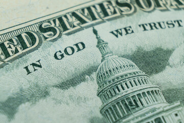 Wall Mural - Macro shot image of the phrase in god we trust. Concept of financial success. Background of 50 dollar bills. Fifty dollars.