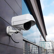 Outdoor camera near skyscraper. City video surveillance system. street surveillance cameras. Concept of safe city. Dome security camera created with Generative AI technology.