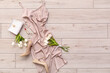 © Pixel-Shot - Silk dress with accessories, heels and tulips on light wooden floor