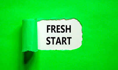Wall Mural - Fresh start and motivational symbol. Concept words Fresh start on beautiful white paper. Beautiful green table green background. Business motivational and Fresh start concept. Copy space.