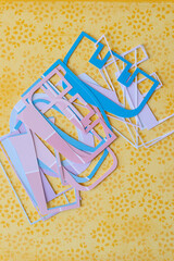 Sticker - letters on yellow paper (basically spells 