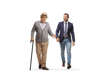 Wall Mural - Elderly man walking and talking to a younger man