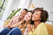 © CarlosBarquero - Three beautiful happy young woman taking smiling selfie looking. at the camera at home. Cheerful female people family and friends together. High quality photo