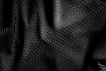 Wall Mural - Dark black and gray blurred gradient and line of cloth or fablic background has a little abstract light.