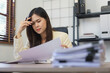 © snowing12 - Secretary concept, Female secretary feeling stressed and headache while reading business document