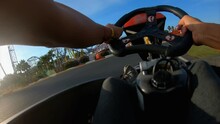 Man Is Driving A Quick Go-cart On The Race Track Outdoors Generative AI
