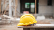 Close up of a Hard hat at a construction site. The safety gear for construction workers.