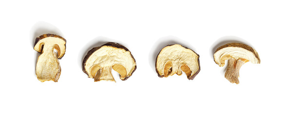 set of dried slices of porcini isolated on white background, dehydrated food boletus mushrooms, top 