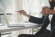 © Sirikarn Rinruesee - Financial analysts analyze business financial reports on a digital tablet planning investment project during a discussion at a meeting of corporate showing the results of their successful teamwork.