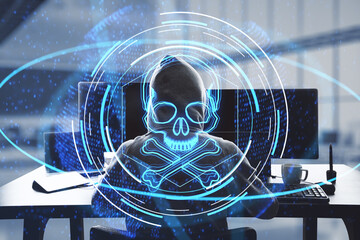 Wall Mural - Back view of hacker using laptop with abstract glowing skull hologram on blurry office interior background. Hacker system or cyber attack concept. Double exposure.