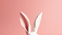 White Rabbit Ears Against Pink Background. Easter Concept With Copy-space. Generative AI.