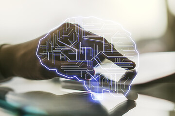 Wall Mural - double exposure of creative human brain microcircuit and hand working with a digital tablet on backg