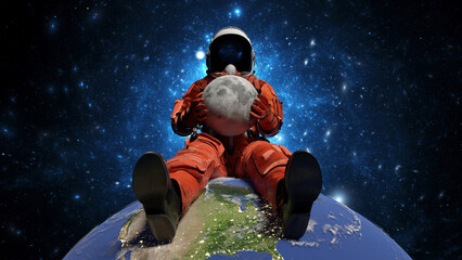 Wall Mural - astronaut sits on planet earth and hold moon in hands. cosmonaut in space, exploration of outer spac