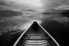 United States, New York, St. Armand, Canoe In Morning Mist After Rain On Lake Placid, Adirondacks State Park, Black And White