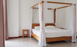 © U-STUDIOGRAPHY DD59  - The nightstand and bed are made of wood. In the white chamber, they placed