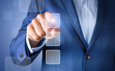 Businessman touching square buttons on digital virtual screen