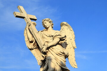 Ponte Sant'Angelo Bridge Statue of an Angel Holding a Cross Close Up in Rome, Italy