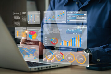 The analyst works on a laptop showing data business analysis and Data Management System with KPI and metrics connected to the database for technology finance operations Data Analytics Statistics.