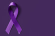 alzheimer's disease day, purple ribbon on purple background, empty space, generative AI