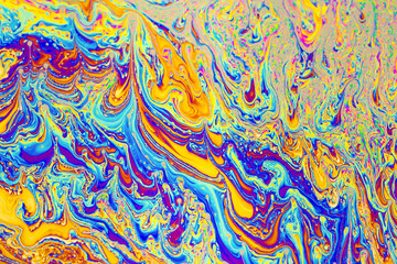 Wall Mural - psychedelic multicolored background abstract. rainbow colors. patterns background. photo macro shot 