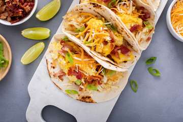 Wall Mural - Breakfast tacos with hash browns, eggs and bacon