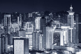 Fototapeta Miasta - Night scenery of high rise buildings in Shenzhen city, viewed from Hong Kong border