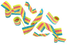 Levitation Of Colored Jelly Candy Strips In Sugar Sprinkles Isolated On Transparent Background.