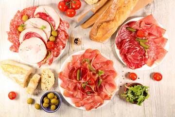 Poster - composition of delicatessen- baguette, salami,sausage,ham