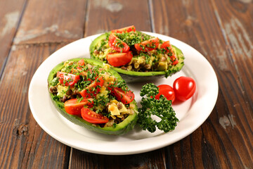 Wall Mural - avocado salad with tomato,  lentils and hersb- Vegetarian mixed salad