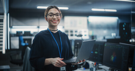 Portrait of an Attractive Empowered Multiethnic Woman Looking at Camera and Charmingly Smiling. Businesswoman at Work, Information Technology Manager, Software Engineering Professional