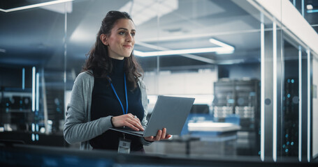 Aufkleber - Portrait of a Beautiful Happy Female Using Laptop Computer, Looking Around the Office, Thinking and Solving Problems. Information Technology Specialist, Software Engineer or Developer