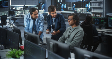 Wall Mural - Team of Three Multiethnic Diverse Software Developers Talk, Discuss and Collaborate on an AI Project. Empowered Young Indian Specialists Work on Digital E-Commerce Startup Business