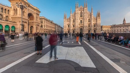 Wall Mural - Panorama showing historic buildings and Milan Cathedral timelapse. Duomo di Milano is the cathedral church located at the Piazza del Duomo square in Milan city in Italy