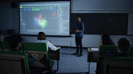 Poster - Young Male Teacher Giving a Data Science Lecture to a Diverse Multiethnic Group of Female and Male Students in a Dark College Space. Projecting Slideshow with a Neural network Model