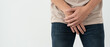 © Shisu_ka - Man hold hand in front of private parts feeling discomfort from disease and inflammation. Venereal, testicular cancer. bladder problems, erectile dysfunction, premature ejaculation, prostate cancer