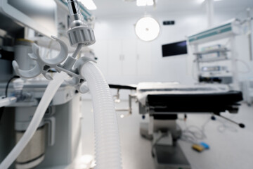 tubes from the artificial respiration apparatus in the operating room the beginning of a surgical operation in the hospital