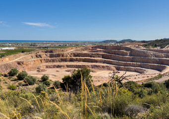 Poster - Open pit mining in Spain, Xilxes mountains. Chalk and Dolomite development in quarry. Mining clay in quarry. Anthropogenic landscape in open cast mine. Limestone mining. Lime and plaster mining.